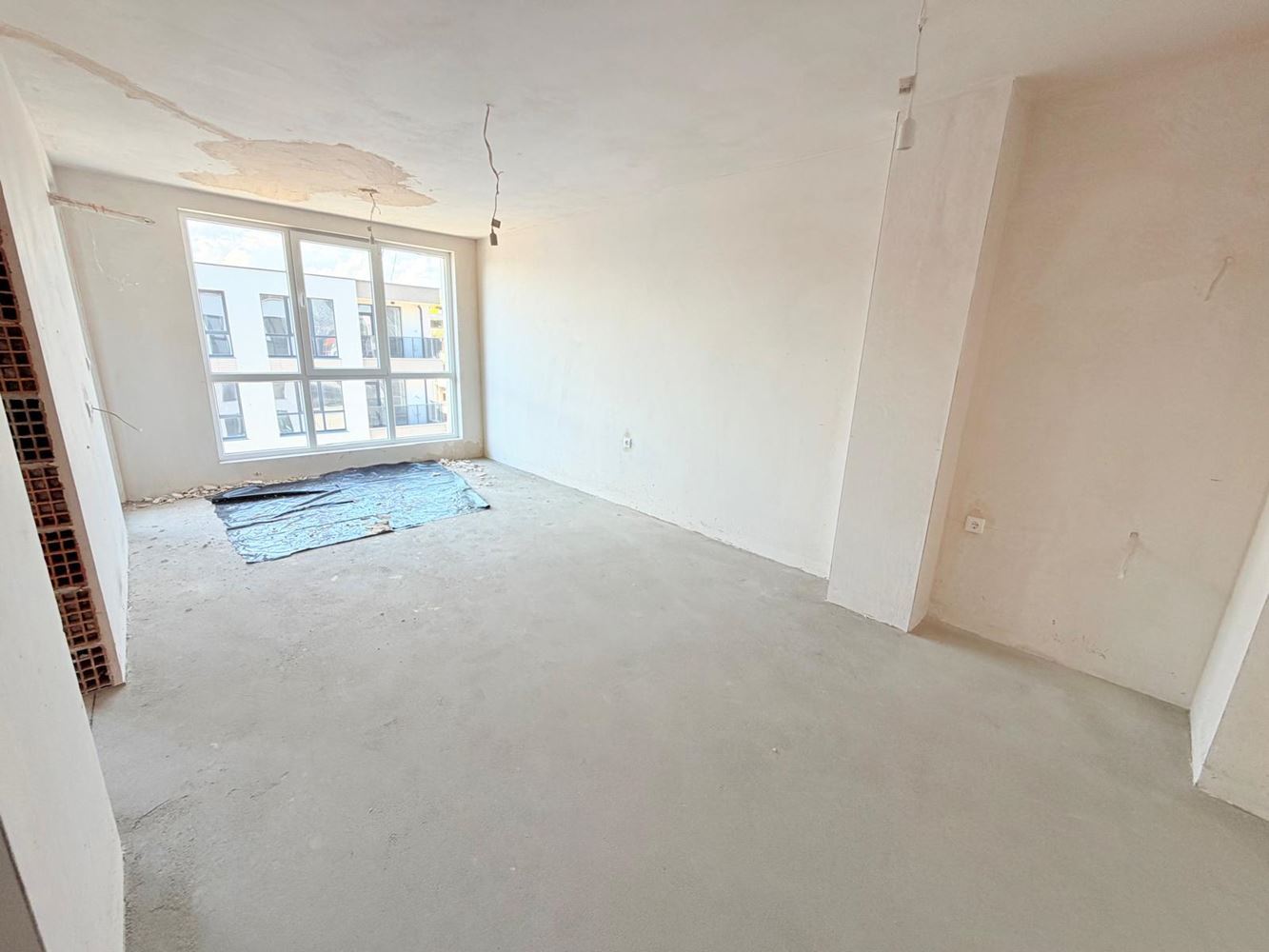 Ein neues Zuhause mit Potenzial und Komfort – 2-Zimmer-Wohnung in einem modernen Gebäude im Wohnviertel Madika